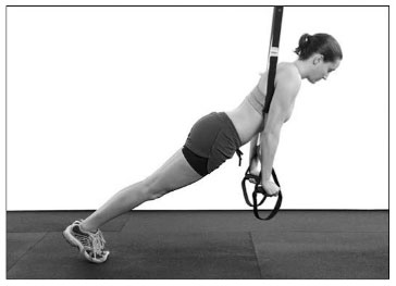 Положение лежа лицом вниз, рукояти подвесных ремней в руках