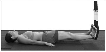 Положение лежа лицом вверх, стопы вложены в петли подвесных ремней
